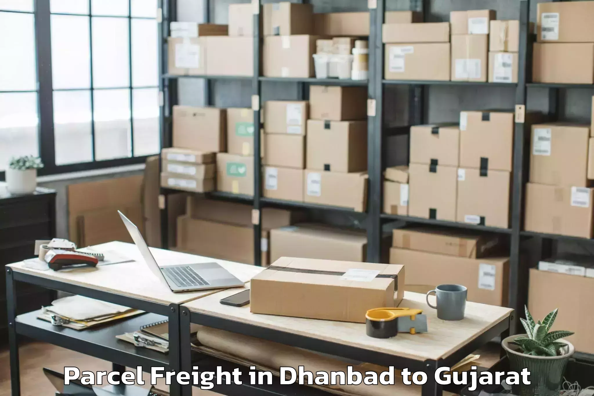 Easy Dhanbad to Shilaj Parcel Freight Booking